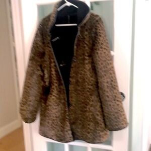 Reversible! Black & faux fur !Bought decades ago. Great pocket’s